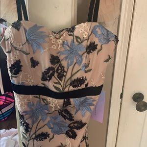 Champagne dress with blue and black flowers